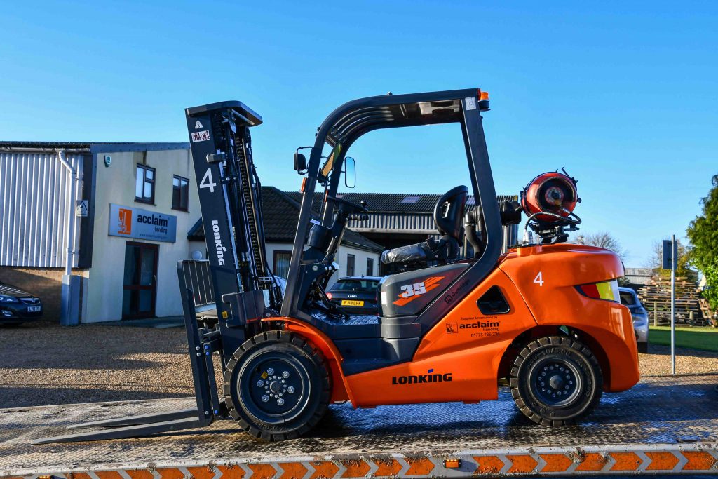 Forklift being delivered on an Acclaim Handling lorry for a short term hire
