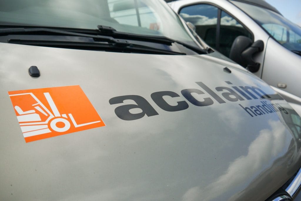 Close-up of the Acclaim Handling logo on the bonnet of a mobile engineer service van