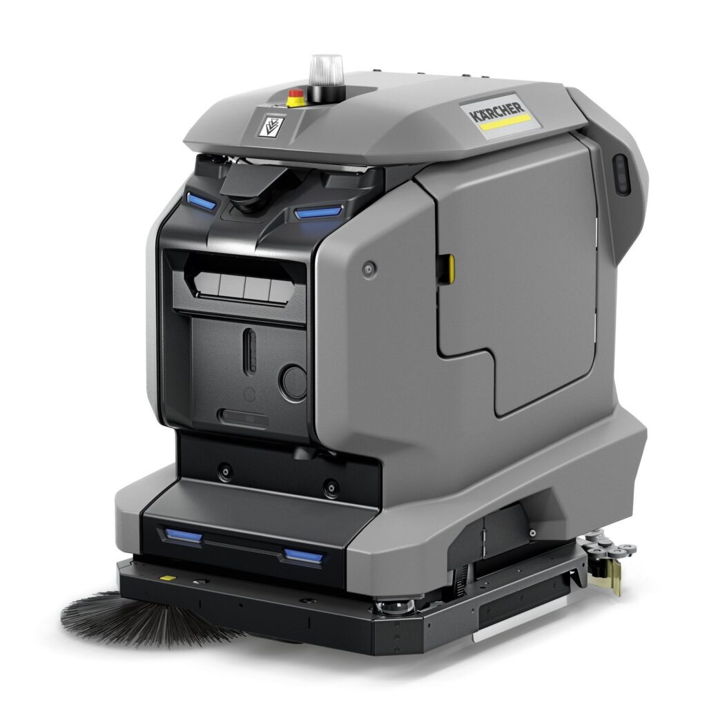 Kärcher KIRA robotic scrubber dryer cleaning a warehouse floor